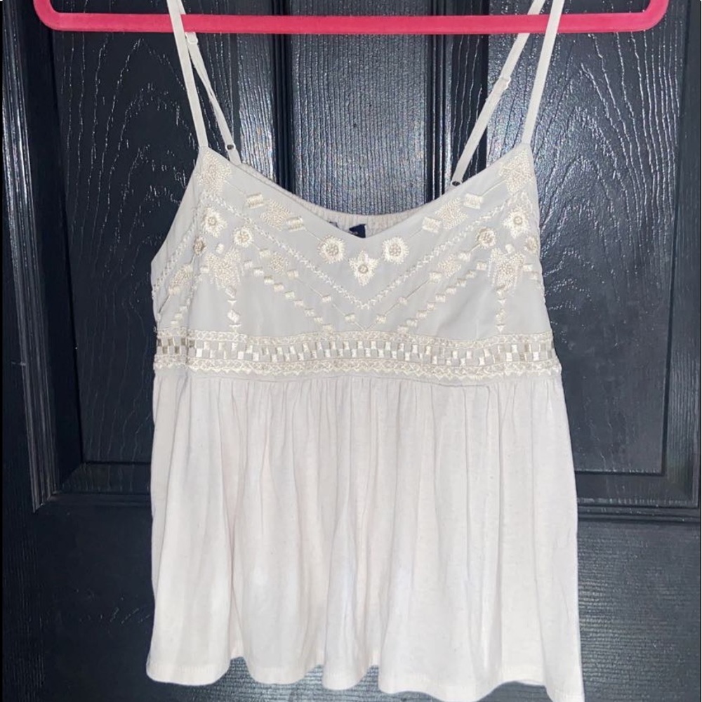 I am selling this cute cream colored white tank top from AEO.